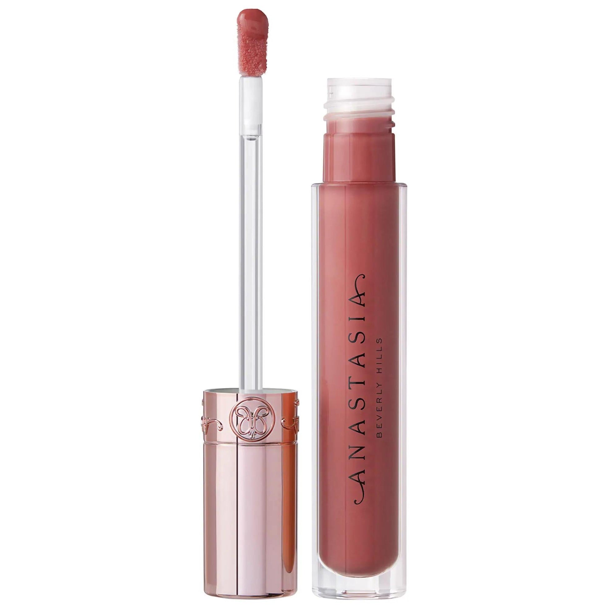 Universal Luminous Tinted Lip Gloss wand in pink mauve gloss with clear tube and rose-gold cap on Tampa Home & Garden Store