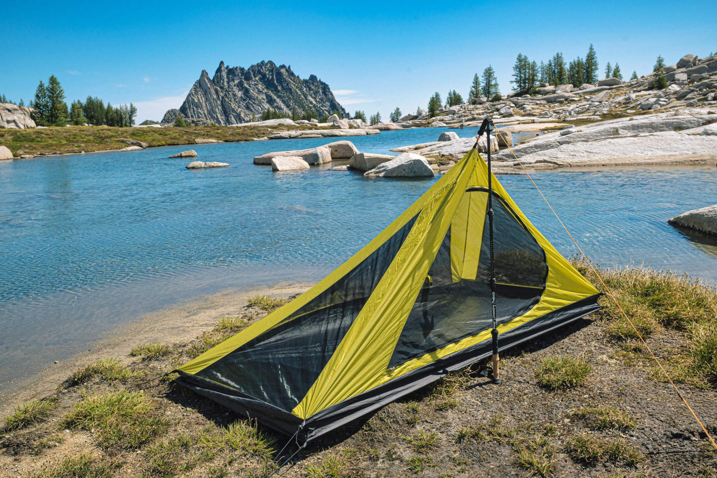 Trekker Pyramid 1-Person Tent by River Country Gear lime-yellow with black details by lake on Tampa Home & Garden Store