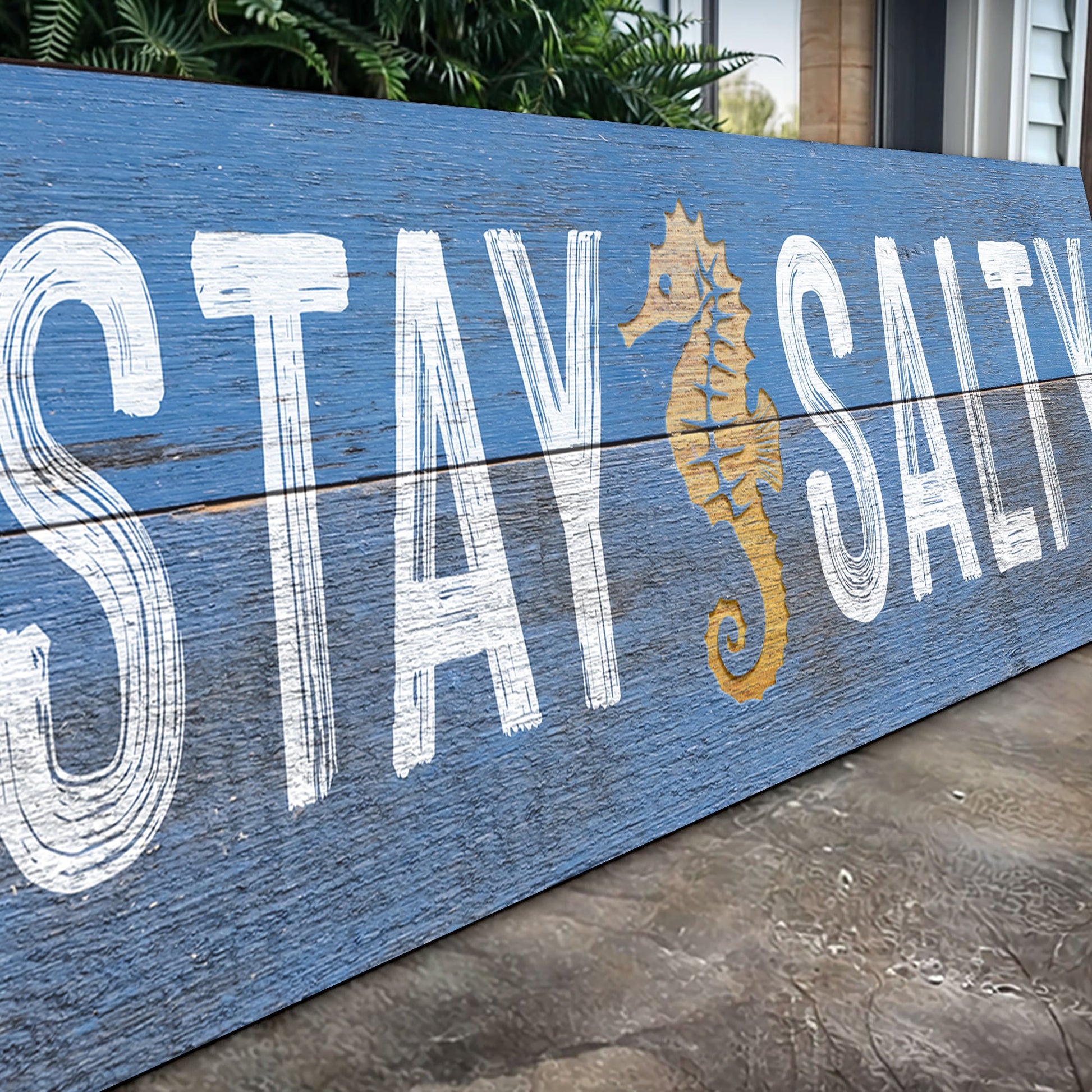 Stay Salty Coastal Sign VII canvas on blue distressed wood with white lettering and gold shell on Tampa Home & Garden Store