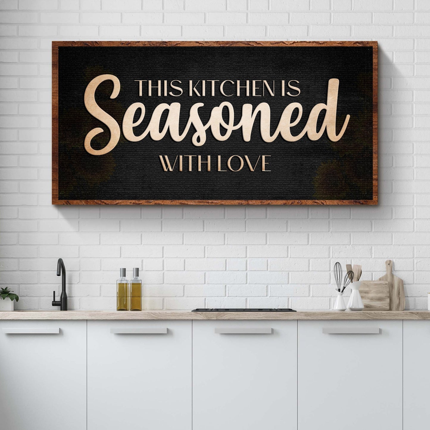 This Kitchen Is Seasoned With Love sign canvas on black with wood frame Tailored Canvases on Tampa Home & Garden Store