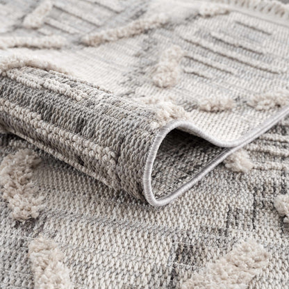 Bogtong High-Low Rustic Rug by Boutique Rugs; grey cream chunky textured pile with rolled edge on Tampa Home & Garden Store