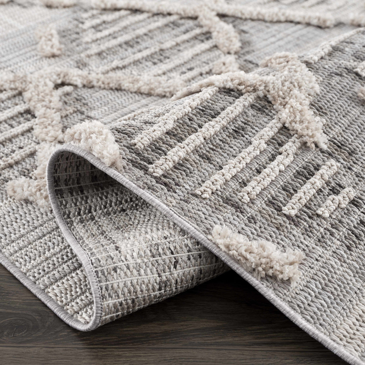 Bogtong High-Low Rustic Rug by Boutique Rugs, gray beige textured woven rug on Tampa Home & Garden Store