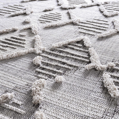 Bogtong High-Low Rustic Rug by Boutique Rugs; light gray textured rug with raised pile on Tampa Home & Garden Store