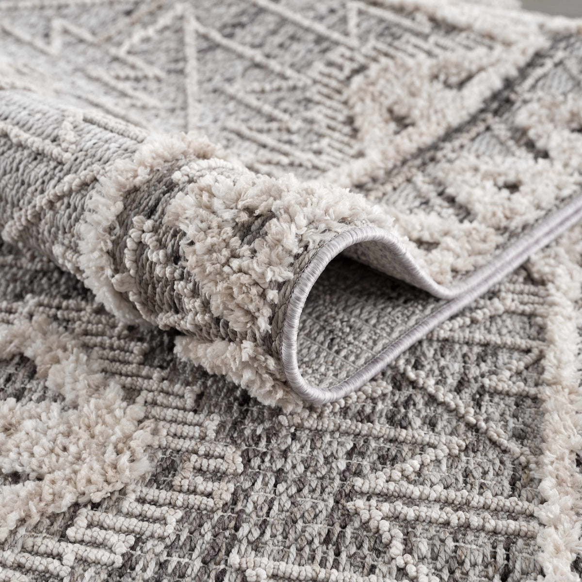 Agoo High-Low Pile Rustic Rug in plush gray-cream tones; Boutique Rugs on Tampa Home & Garden Store