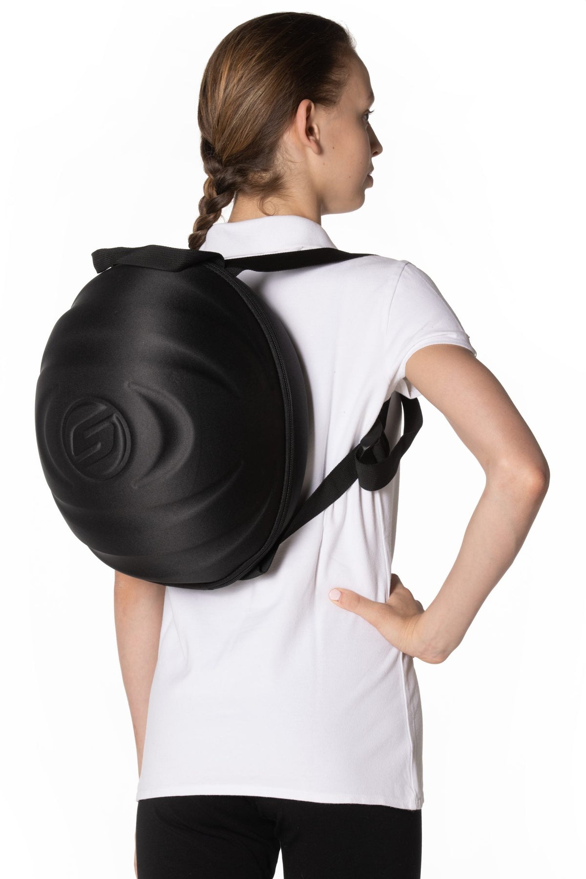 Helmet-shaped backpack in matte black worn by a model in a white polo shirt on Tampa Home & Garden Store