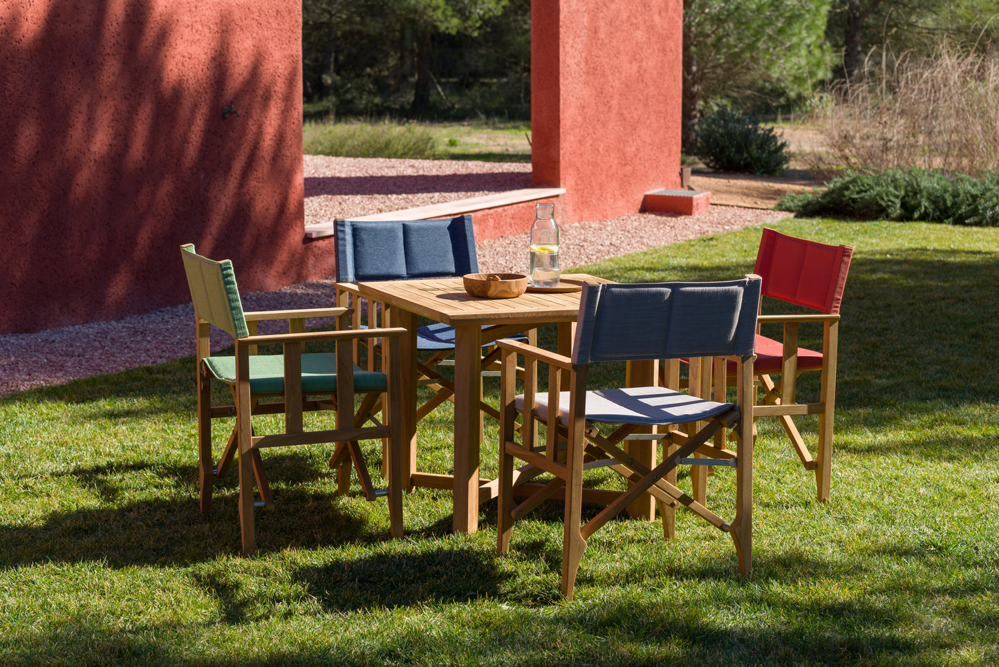 Zircon Teak Director Chair red cushion teak frame LifestyleGarden US outdoor seating on Tampa Home & Garden Store