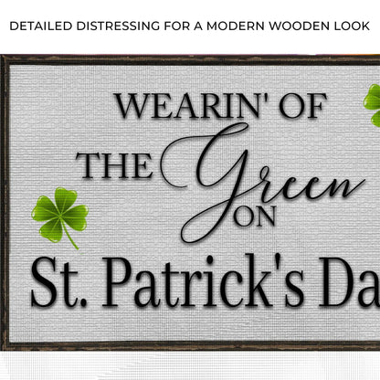 Wearin' Of The Green Sign canvas with weathered wood frame, serif lettering and green shamrocks on Tampa Home & Garden Store