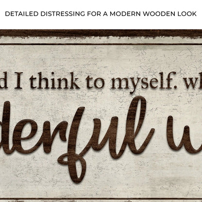 What A Wonderful World Sign III canvas with brown distressed script on white background on Tampa Home & Garden Store