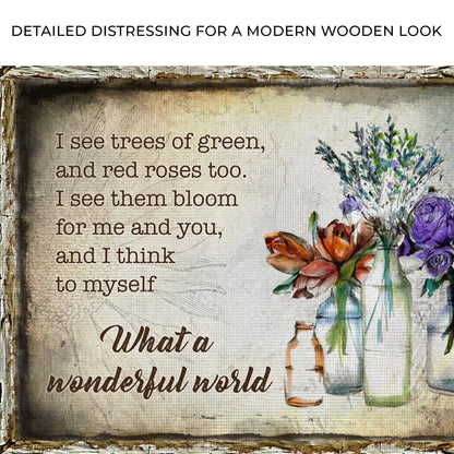What A Wonderful World Sign VIII canvas with distressed vintage look and colorful bouquet accents on Tampa Home & Garden Store