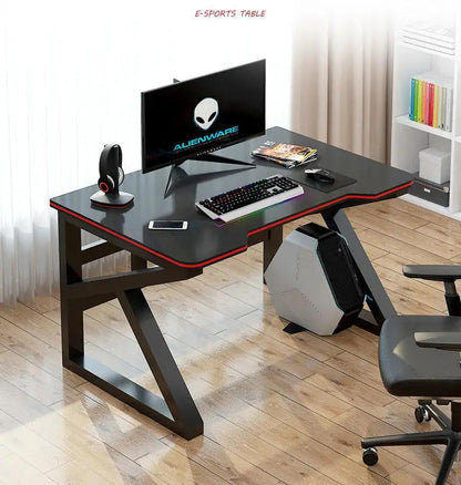 Gaming desk with black top, red trim, Alienware monitor, keyboard, mouse, PC tower on Tampa Home & Garden Store