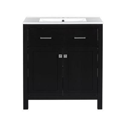 Black bathroom vanity with white ceramic sink, two-door cabinet and sleek metal handles on Tampa Home & Garden Store