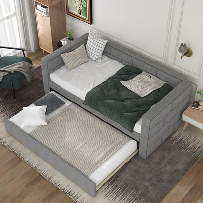 Upholstered twin daybed with trundle in gray fabric, padded back and sides on Tampa Home & Garden Store