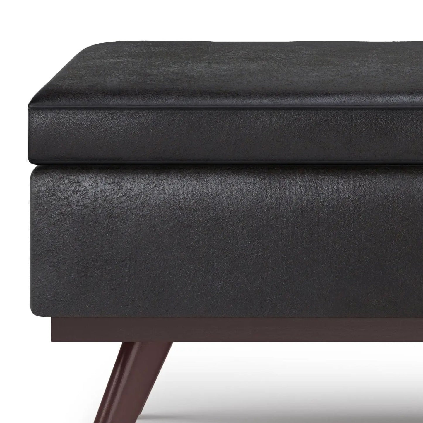 Owen lift-top storage ottoman in black faux leather with mid-century angled wooden legs on Tampa Home & Garden Store