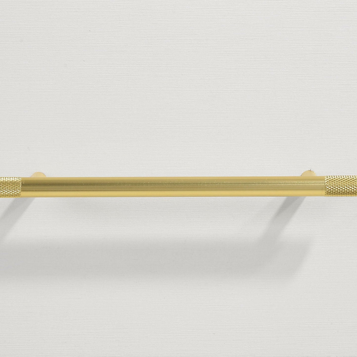 Gold metal bar with knurled ends mounted on white wall, Malcolm bedroom set by HouseOfZazla on Tampa Home & Garden Store