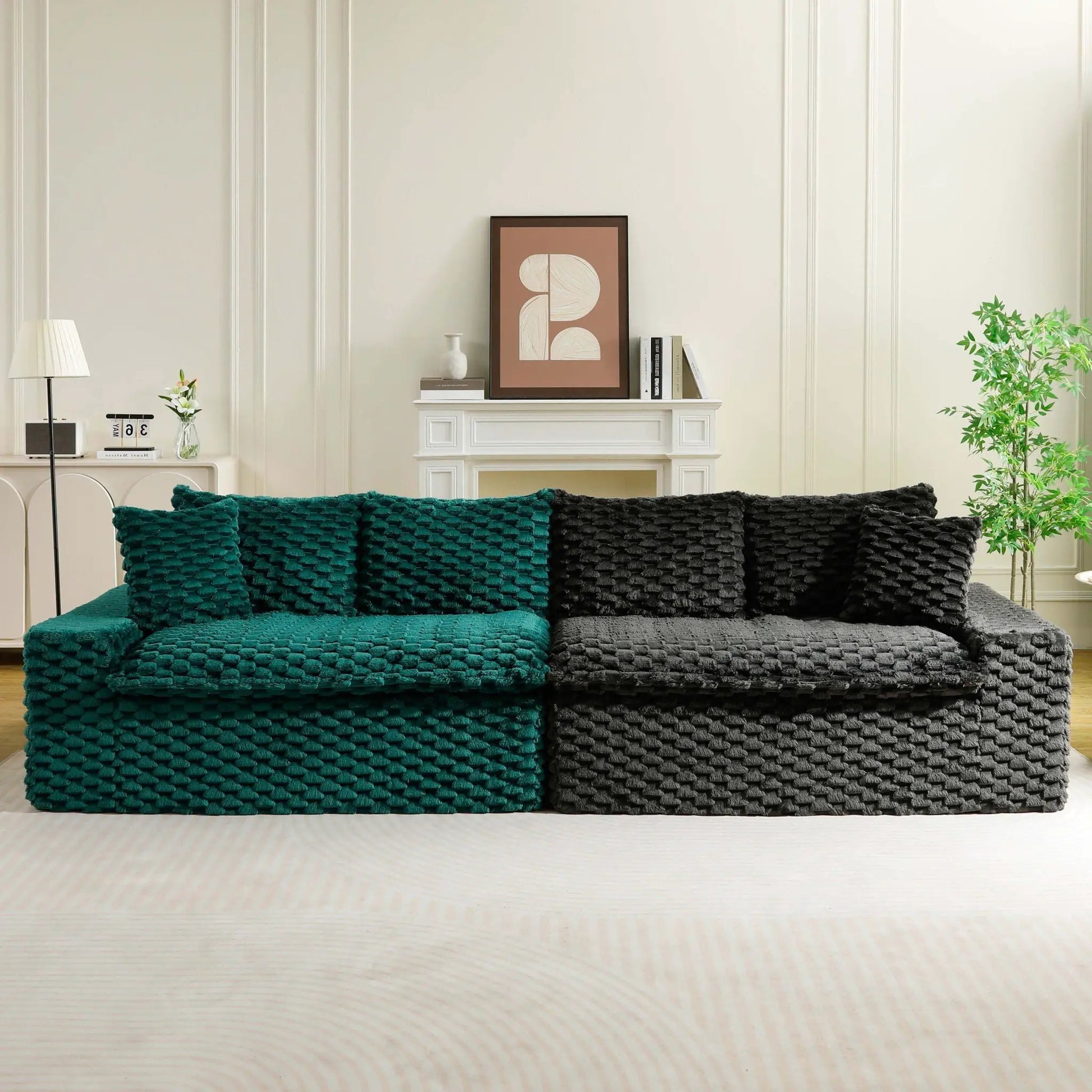 Multifunctional sofa with teal and black chunky knit blankets in a contemporary living room on Tampa Home & Garden Store