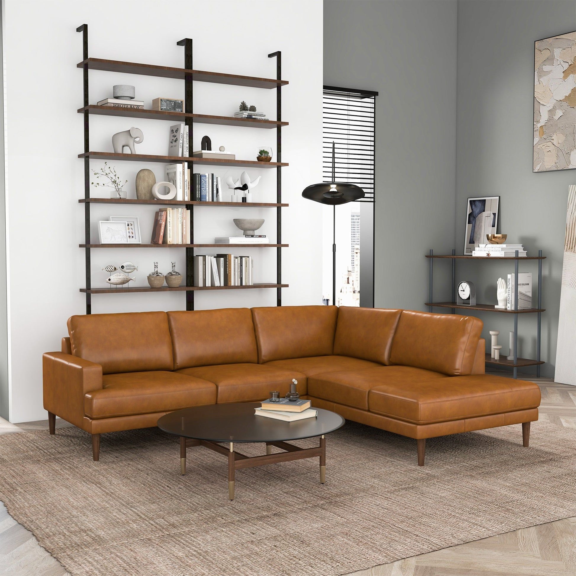 Corbin L-shaped tan leather sectional sofa with chaise in a contemporary living room on Tampa Home & Garden Store