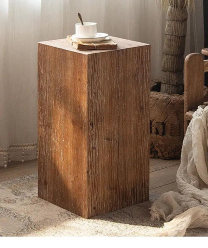 Solid wood retro square corner table in warm brown finish with cup and napkin on top on Tampa Home & Garden Store