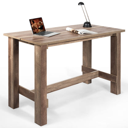 Multifunctional counter height dining table in wood with sturdy legs, laptop and magazine on Tampa Home & Garden Store