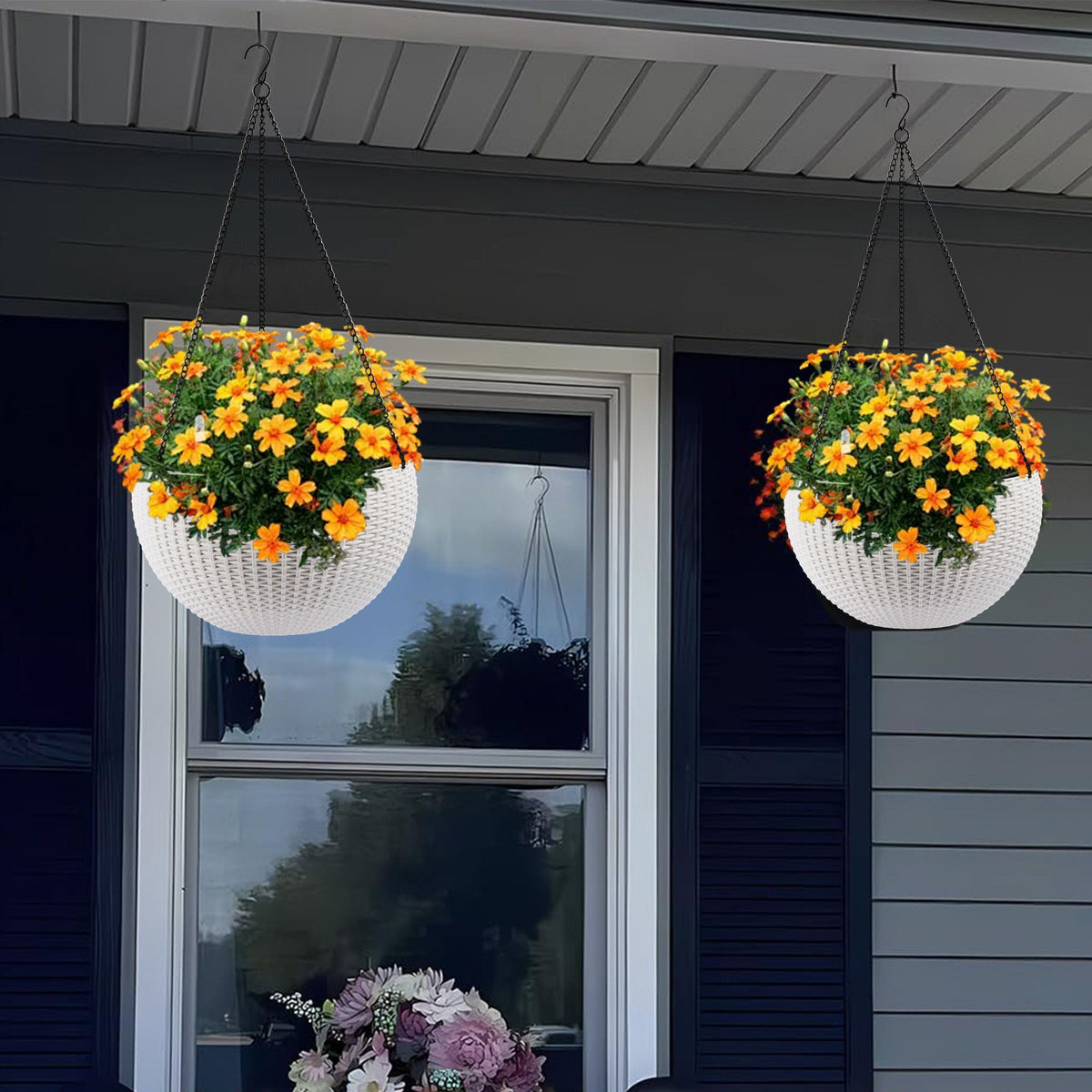 Self Watering Hanging Planters two white woven baskets with orange flowers HouseOfZazla on Tampa Home & Garden Store