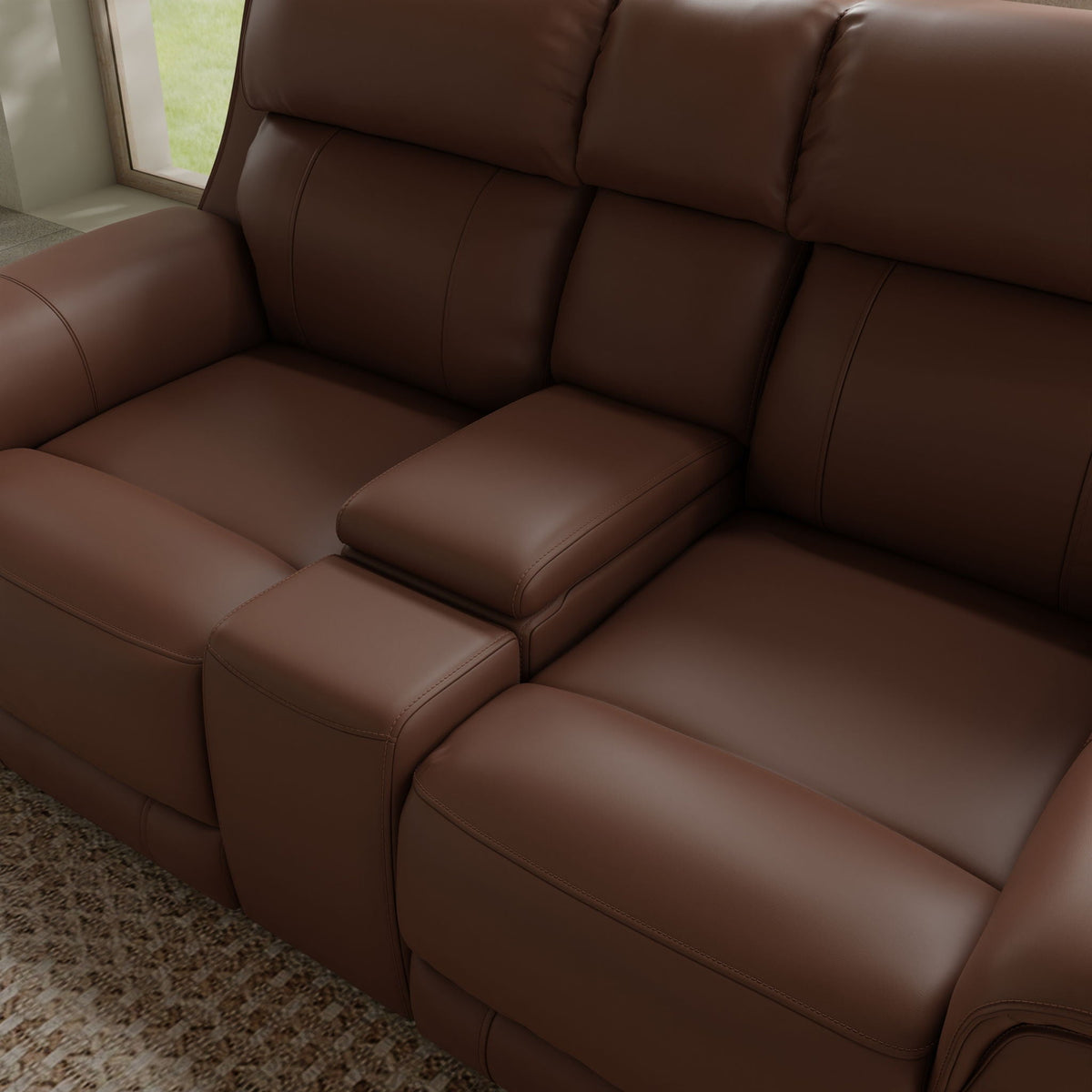 Brown leather dual power reclining loveseat with center console and stitched seams on Tampa Home & Garden Store