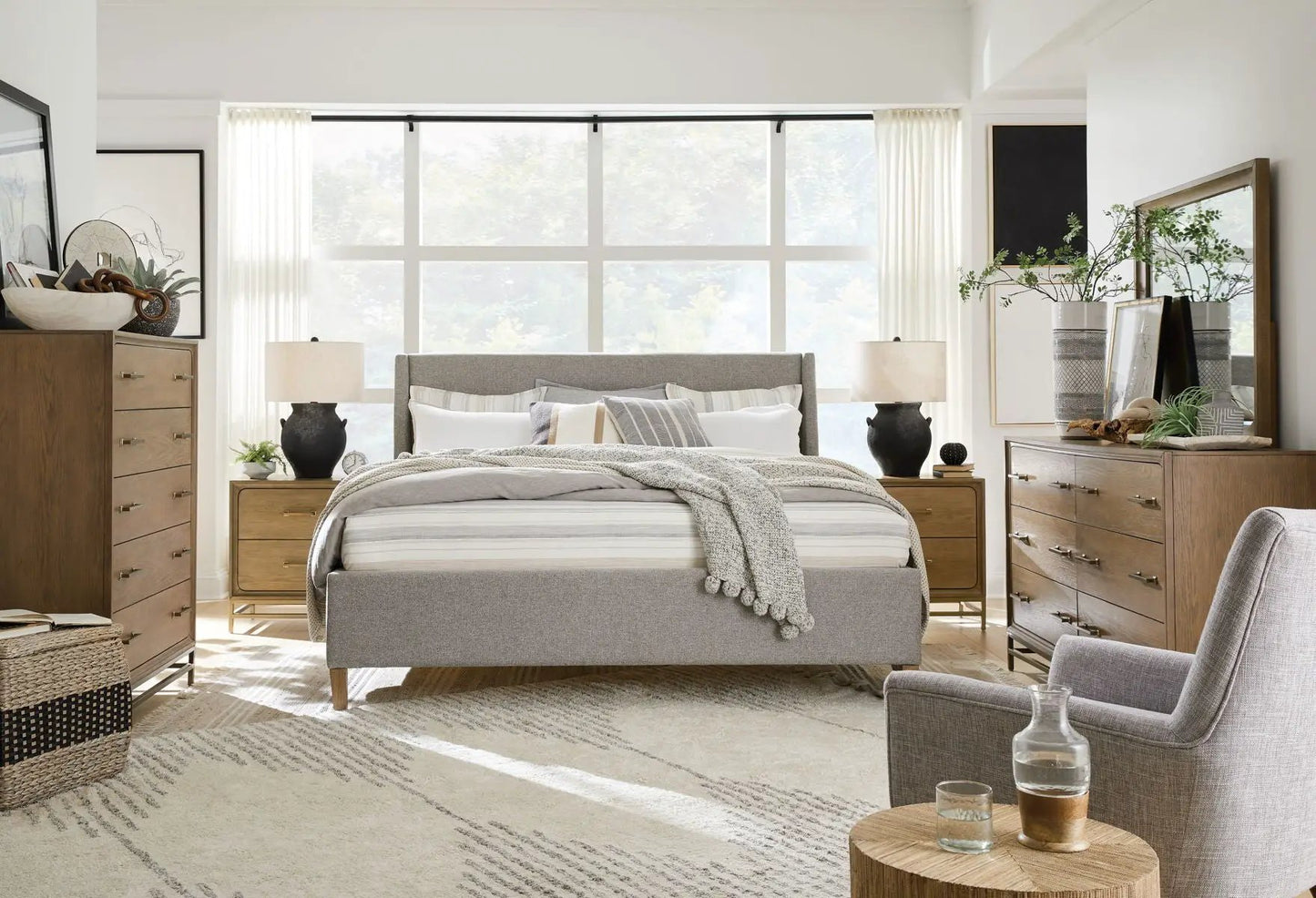 Pair of Lindon Drawer Nightstands Belgian Wheat by Unique Piece Furniture beside a grey bed on Tampa Home & Garden Store