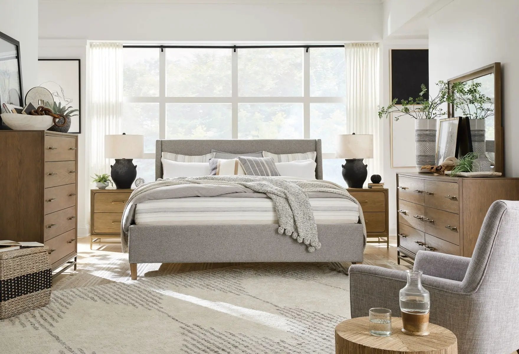 Pair of Lindon Drawer Nightstands Belgian Wheat by Unique Piece Furniture beside a grey bed on Tampa Home & Garden Store