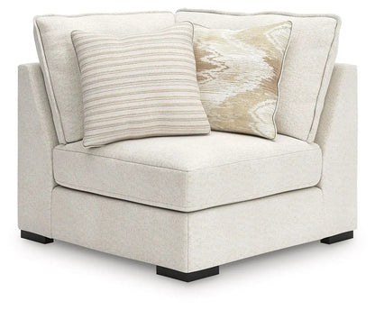 Donelson Creek Sectional by Unique Piece Furniture, beige stationary sofa with two pillows on Tampa Home & Garden Store