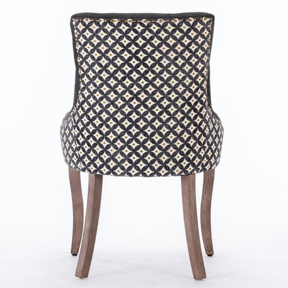 Ultra side dining chair with solid wood legs, black white patterned fabric, gold studs on Tampa Home & Garden Store