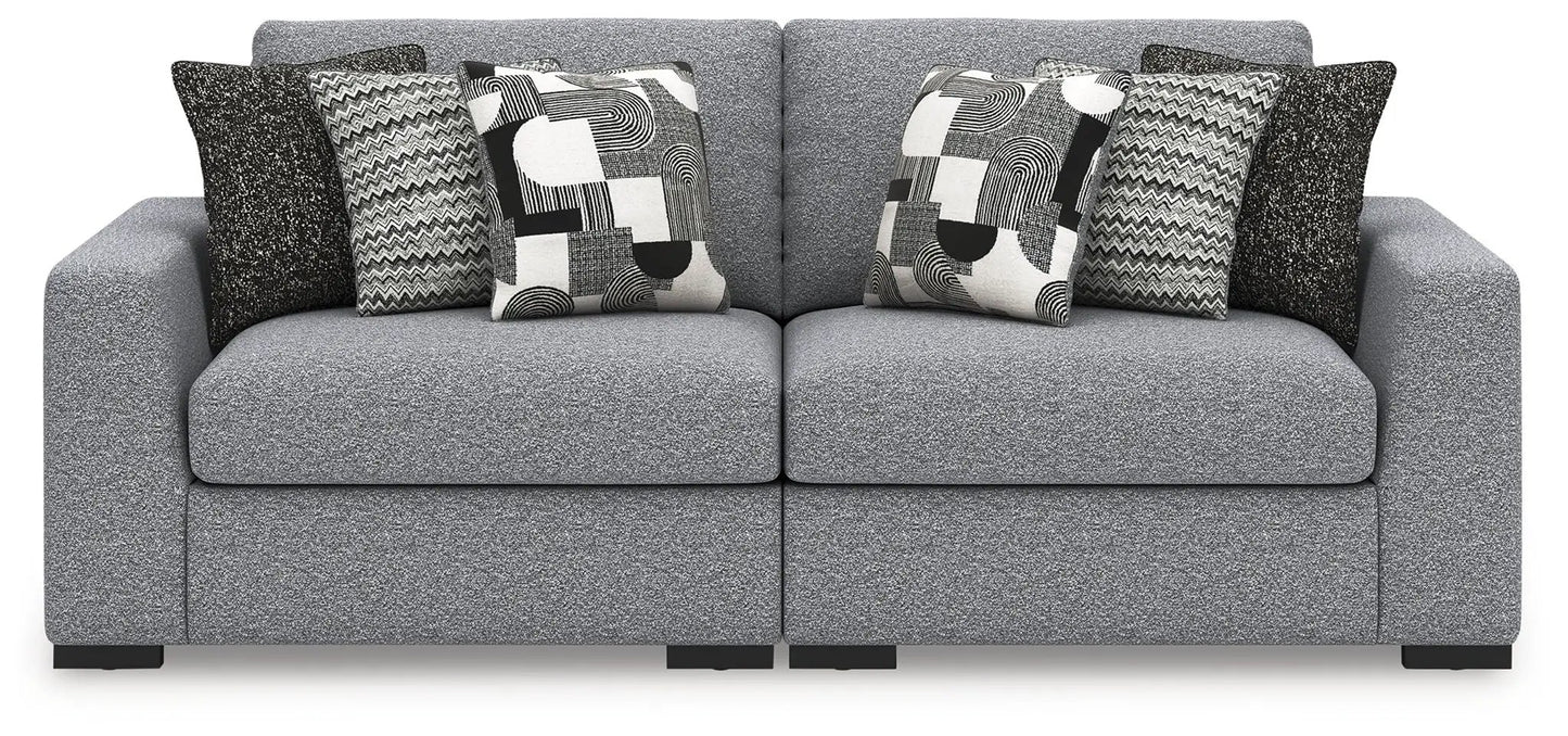 Bealton stationary sectional sofa in gray textured fabric with geometric throw pillows on Tampa Home & Garden Store
