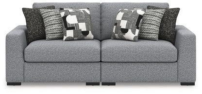 Bealton stationary sectional sofa in gray textured fabric with geometric throw pillows on Tampa Home & Garden Store
