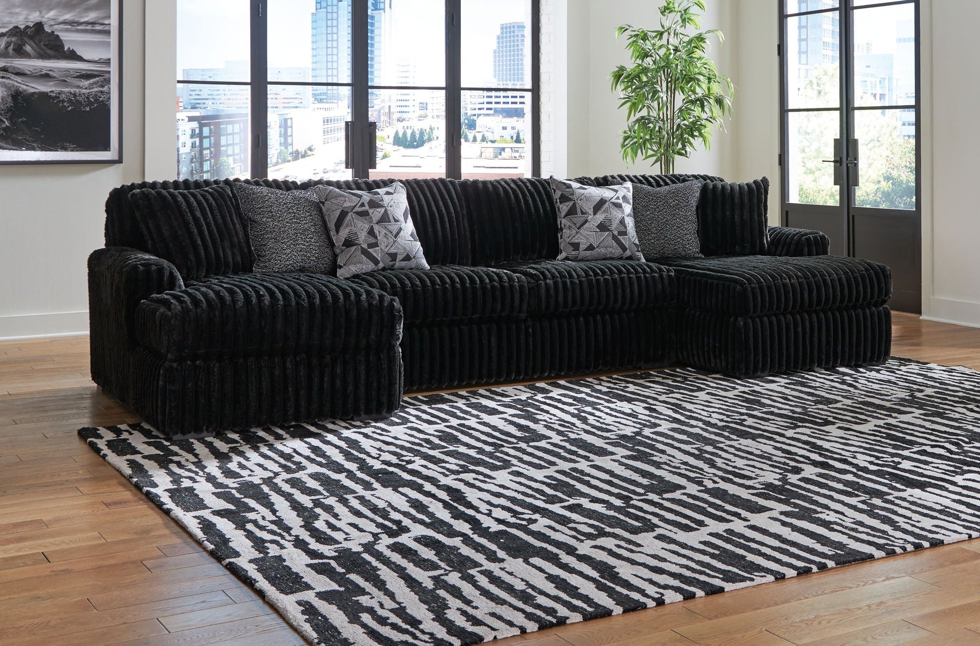 Midnight-Madness Sectional Set black velvet 4-piece by Unique Piece Furniture with pillows on Tampa Home & Garden Store