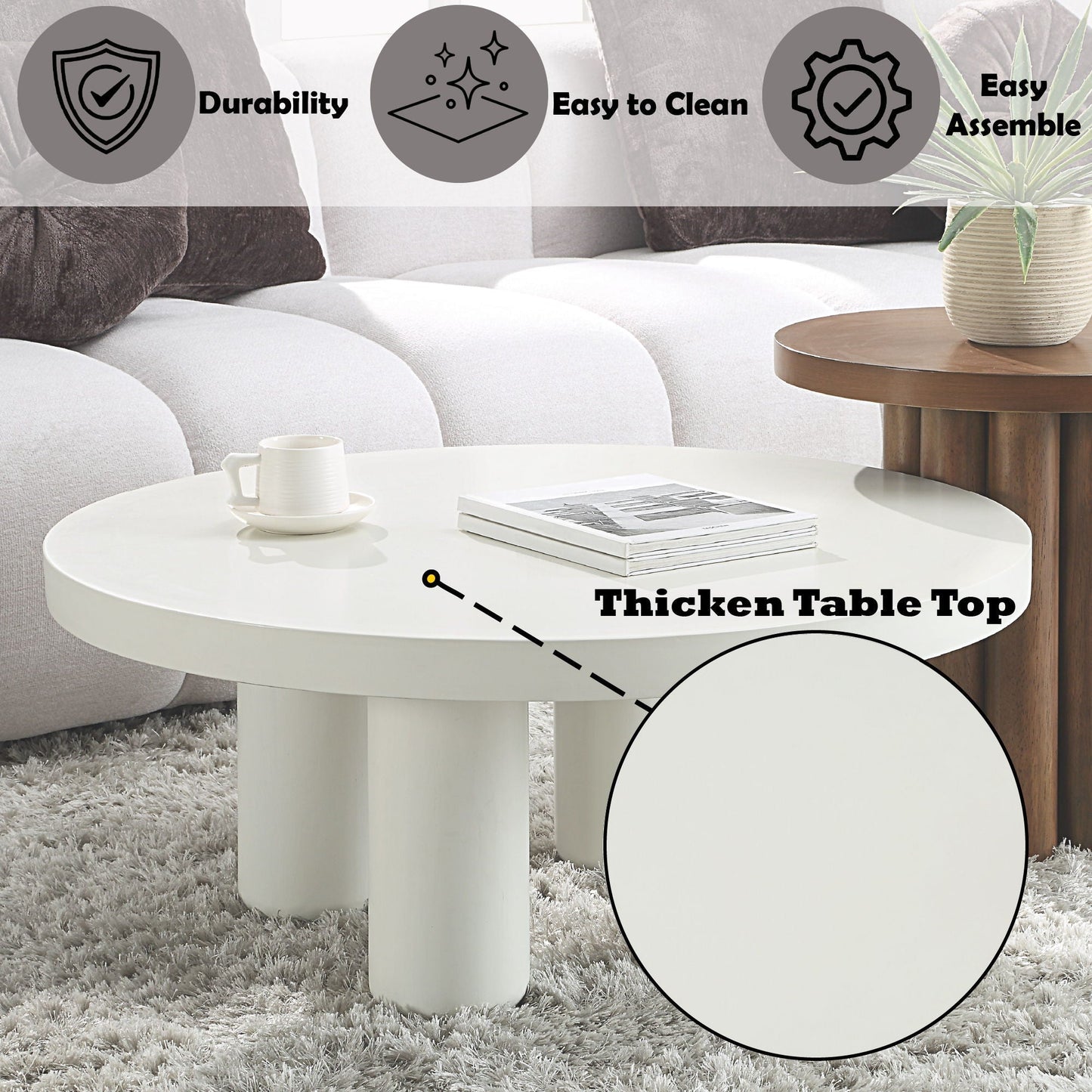 Loanna White Coffee Table by HouseOfZazla, round white top with thick legs in living room on Tampa Home & Garden Store