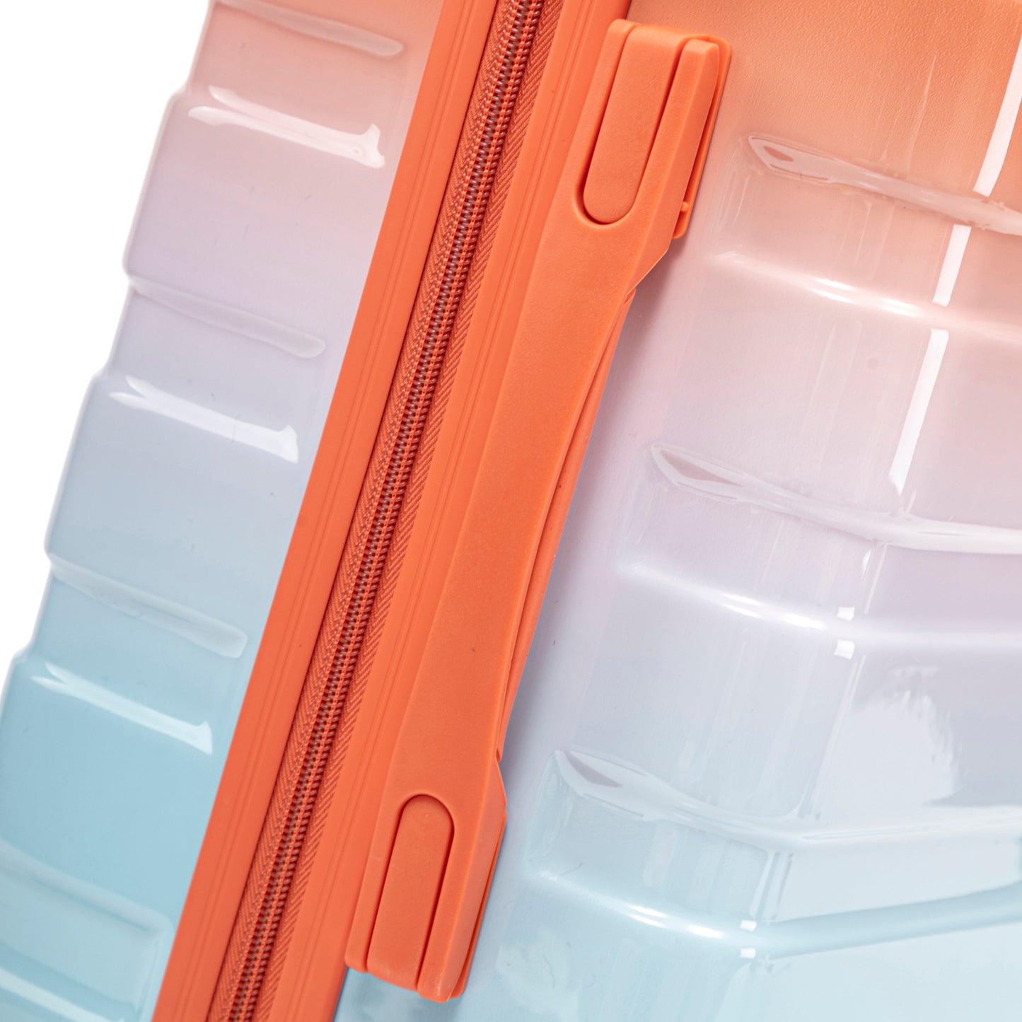 2pc spinner luggage set gradient blue to peach with orange zipper detail on Tampa Home & Garden Store