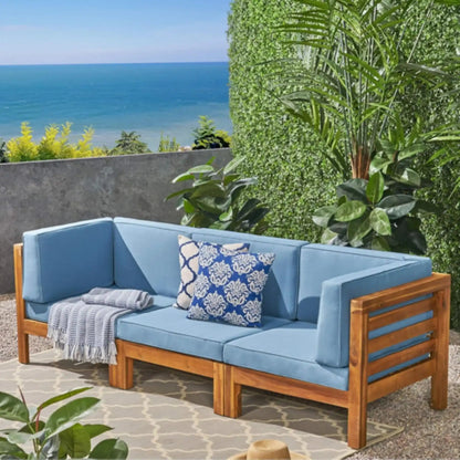 Oana 3 Piece Outdoor Sofa Set with water resistant cushions in blue fabric and natural wood frame on Tampa Home & Garden Store