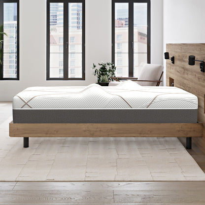 Ghostbed Massage Mattress Hybrid Profile on a dark fabric platform bed with white quilted bedding on Tampa Home & Garden Store