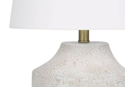 Table lamp with cream concrete base, brass stem, and white fabric shade by HouseOfZazla on Tampa Home & Garden Store