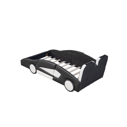 Race car shaped twin platform bed with wheels, black upholstered sides and pine wood slat base on Tampa Home & Garden Store