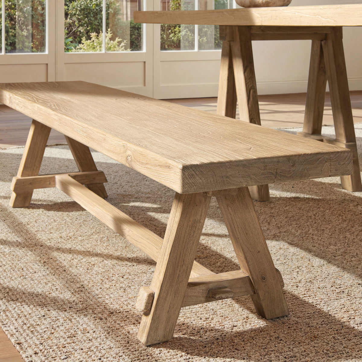 Natural dining bench with pillar base in solid reclaimed elm on Tampa Home & Garden Store