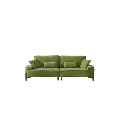 Comfortable Deep Seated Sofa With Pillows in green upholstery with wooden legs on Tampa Home & Garden Store