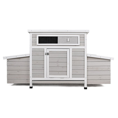 Large chicken coop with dual nesting boxes, gray wood and white trim, sturdy latch on Tampa Home & Garden Store