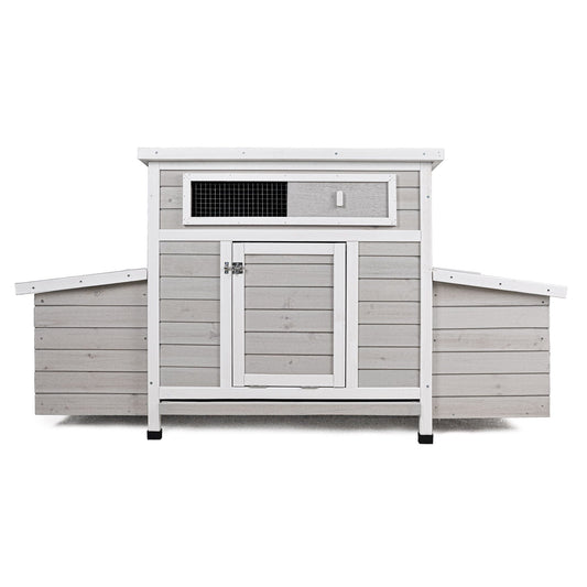 Large chicken coop with dual nesting boxes, gray wood and white trim, sturdy latch on Tampa Home & Garden Store