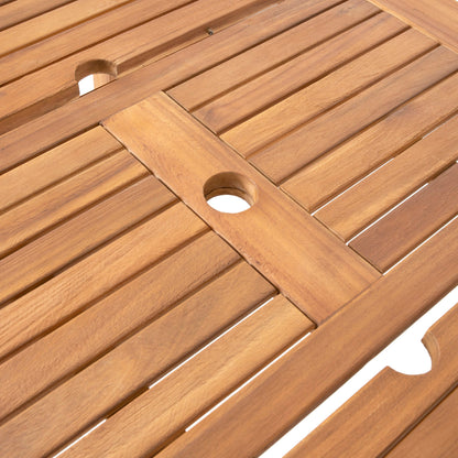 Outdoor acacia wood dining table top with round umbrella holes in a rustic slatted finish on Tampa Home & Garden Store