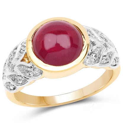 Ring with a deep red glass-filled ruby cabochon set in a yellow gold bezel, diamond-accented silver shoulders on Tampa Home & Garden Store