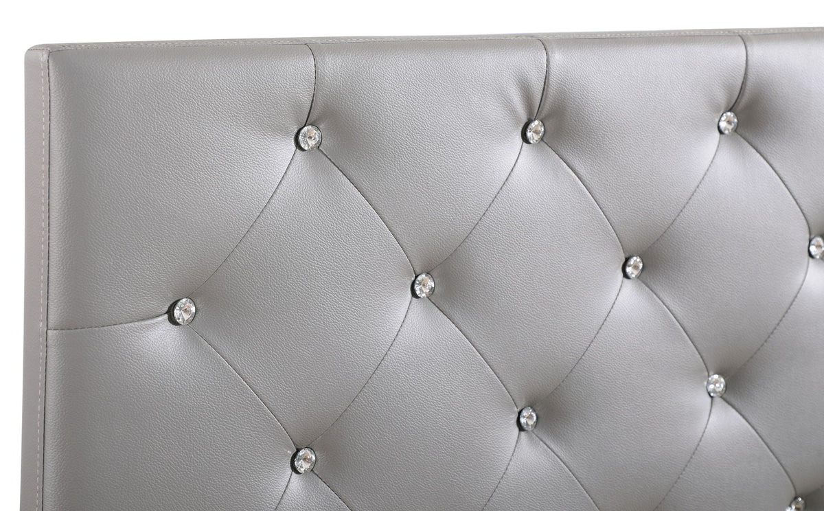 Upholstered headboard with diamond tufting and crystal button accents in gray faux leather on Tampa Home & Garden Store