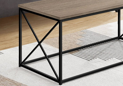 Rectangular coffee table with warm wood top and black metal frame with X-brace sides on Tampa Home & Garden Store