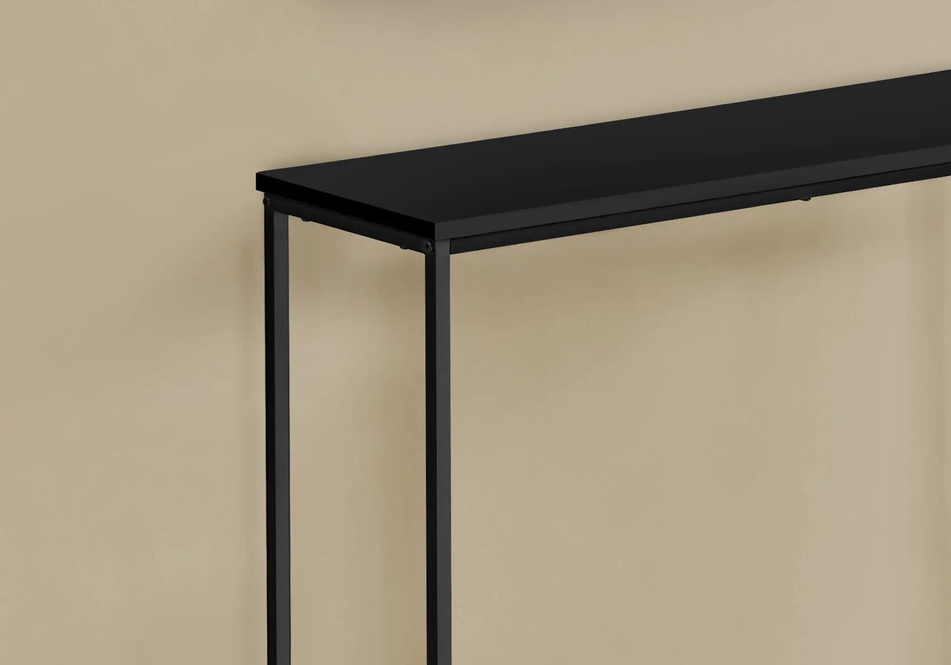 Accent console table in black with a slim metal frame and rectangular top on Tampa Home & Garden Store