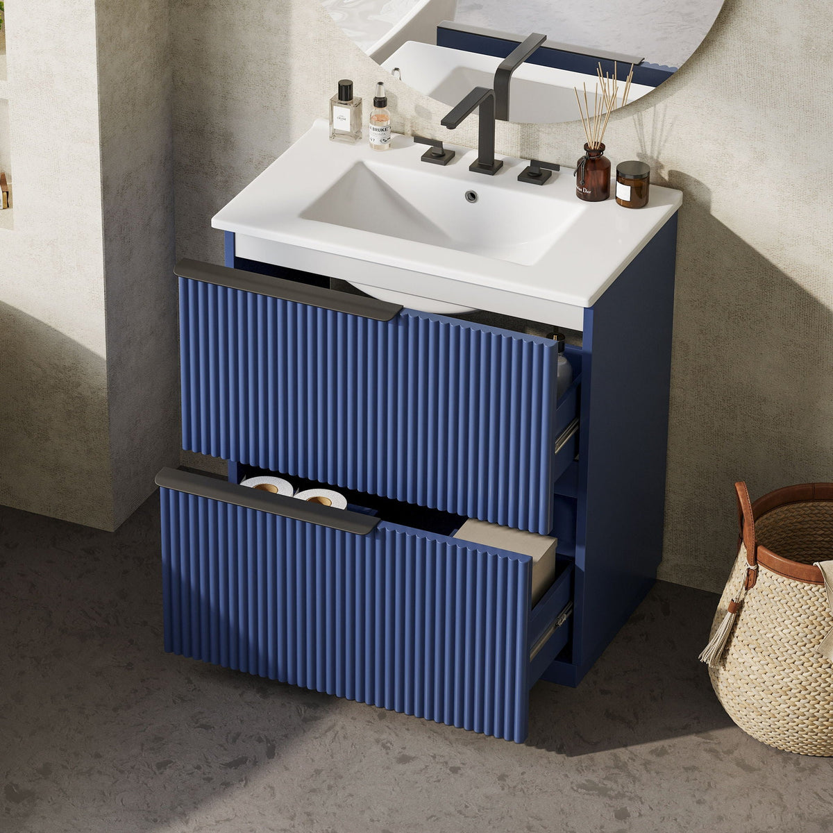 Fluted blue bathroom vanity with white ceramic sink and matte black faucet on counter on Tampa Home & Garden Store