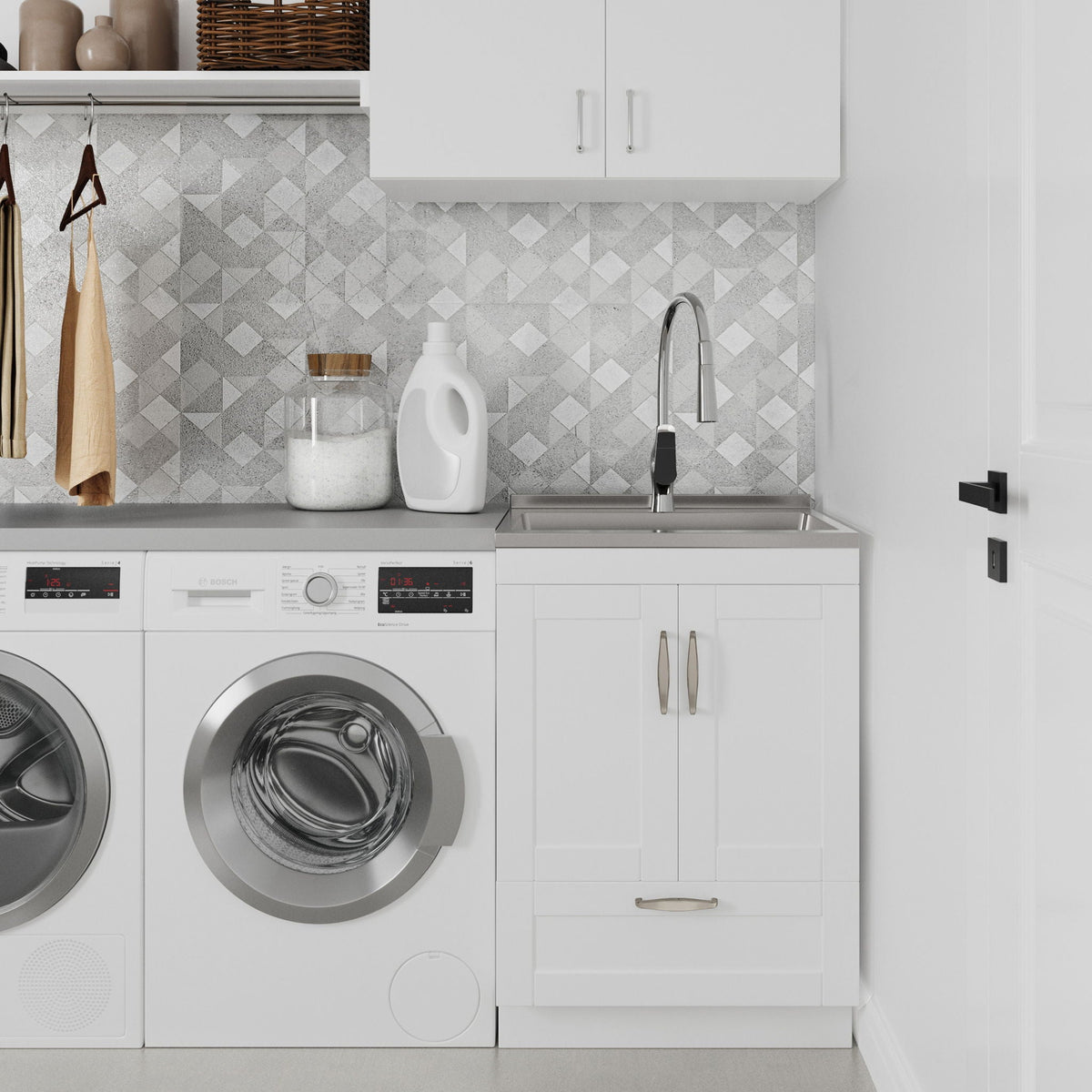 Deluxe white laundry cabinet with sink and chrome faucet, Bosch washer and dryer on Tampa Home & Garden Store