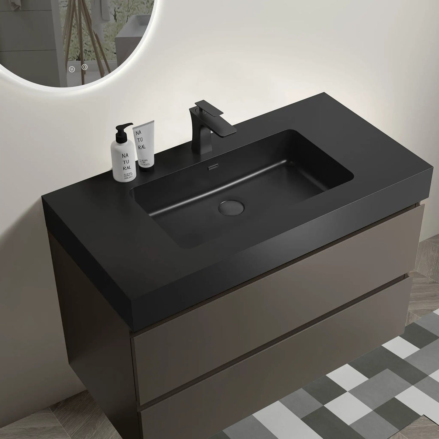 Black matte floating bathroom vanity with sink, storage drawers, and a backlit mirror on Tampa Home & Garden Store