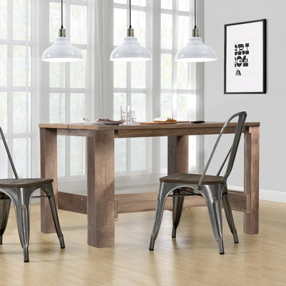 Multifunctional counter height dining table in warm wood with two metal industrial chairs on Tampa Home & Garden Store